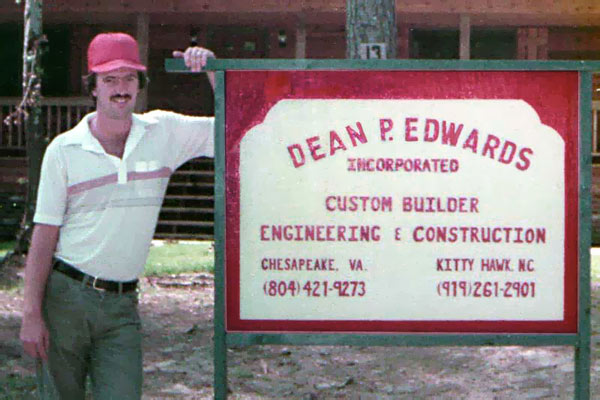 Dean P. Edwards with business sign
